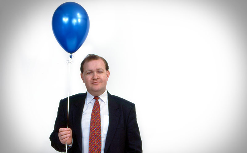Editorial photography, portrait with a balloon for an Insurance company